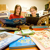 Katie Clark and Jessica Carr helped sort books to be sent to Belize.