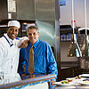 Fontbonne University > African chef and Hispanic businessmen in kitchen